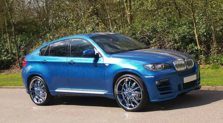 Total covering BMW X6 bleu