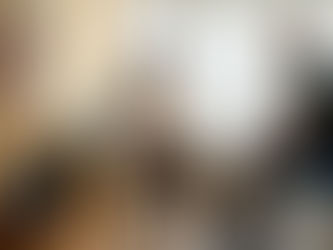 Physiotherapist consulting patient in clinic room