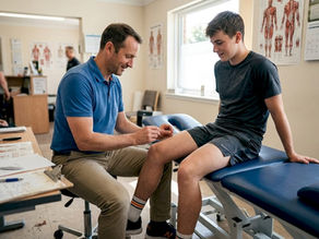 Acupuncturist treating athlete in clinic setting