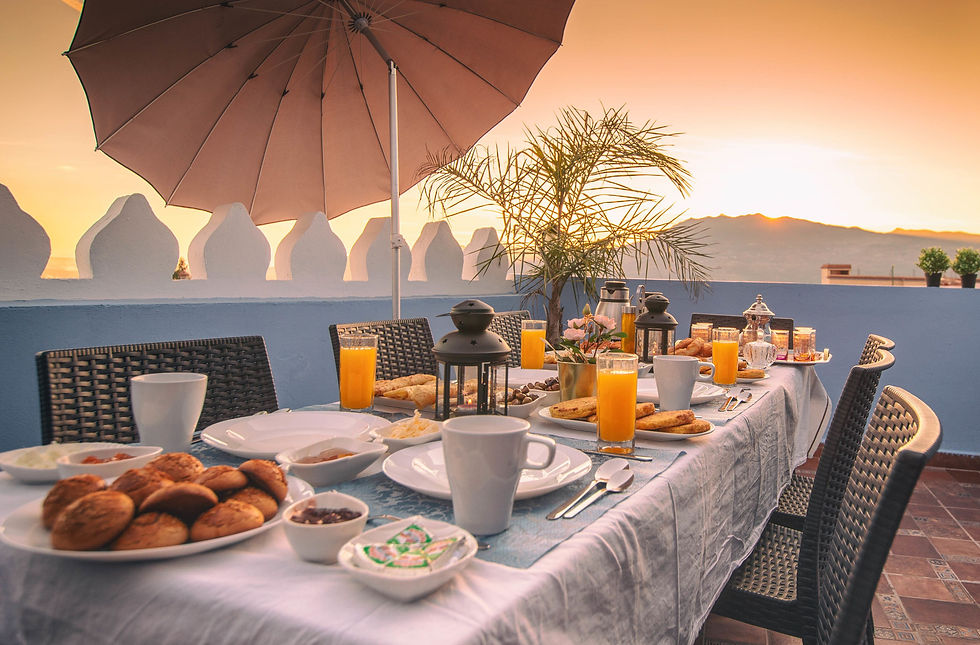 Breakfast laid out on a terrace at a Chefchaouen hotel