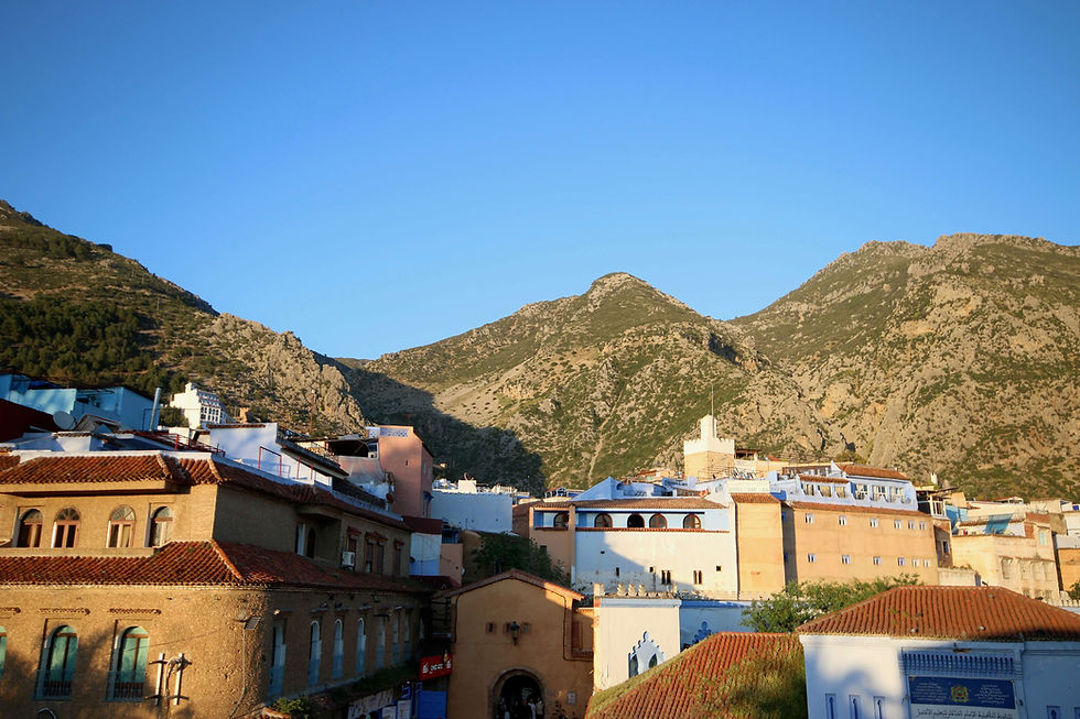 Sunset illuminates the medina of Chefchaouen, which can be visited with a Tangier hire car