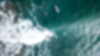 An aerial view of surfers at Lobitos - one of the best places to surf in Peru
