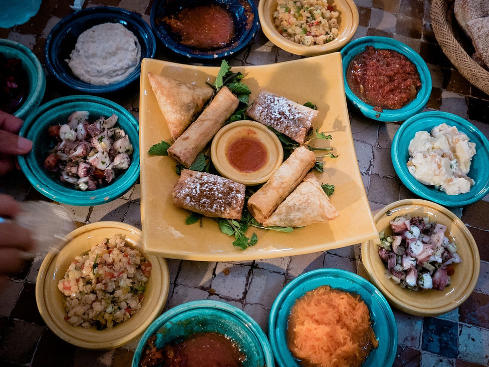 small plates of Moroccan dishes on a food tour of Tangier