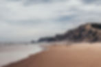 A wild beach in the Algarve - one of the best places to surf in Portugal
