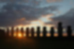 Sunset behind a line of moai statues in Easter Island - one of the best places to dive in South America