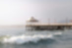 A jetty extends into the water at Huanchaco in Peru