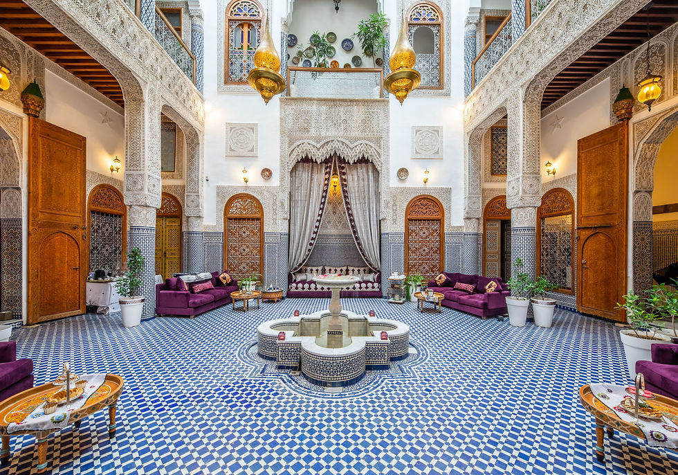 Inside the beautifully decorated interior courtyard of a family-friendly Fes riad