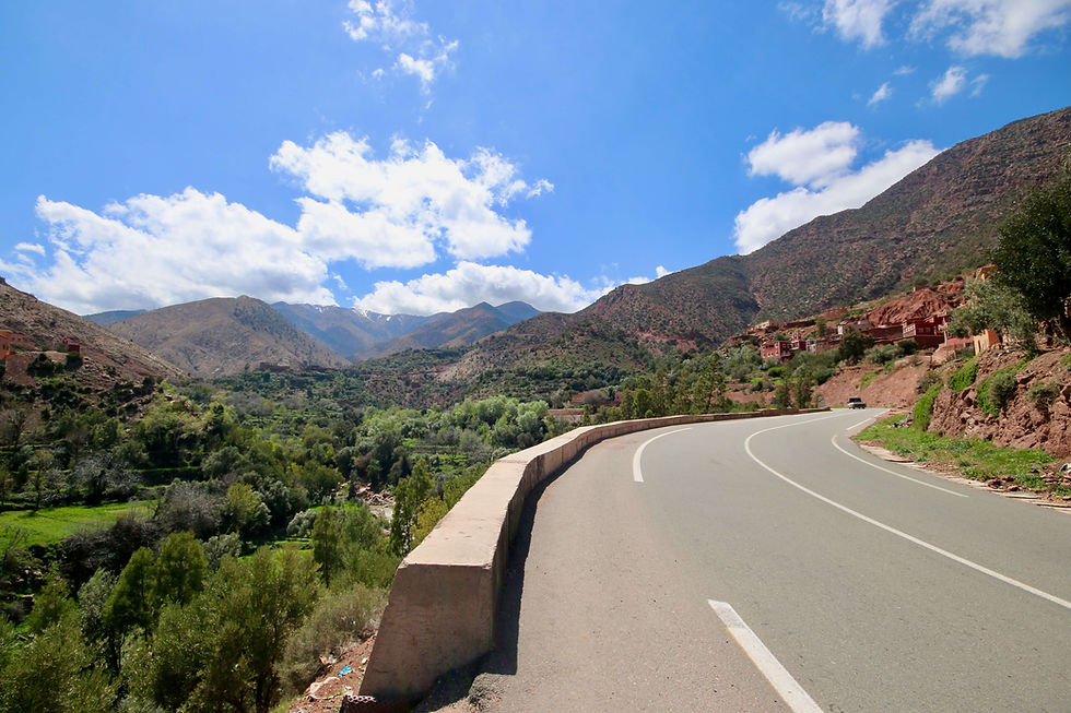 A road winds through the Atlas Mountains of Morocco