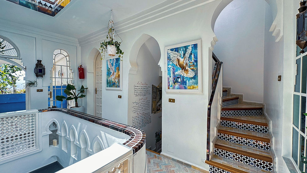 The whitewashed interior of an affordable hotel in Chefchaouen