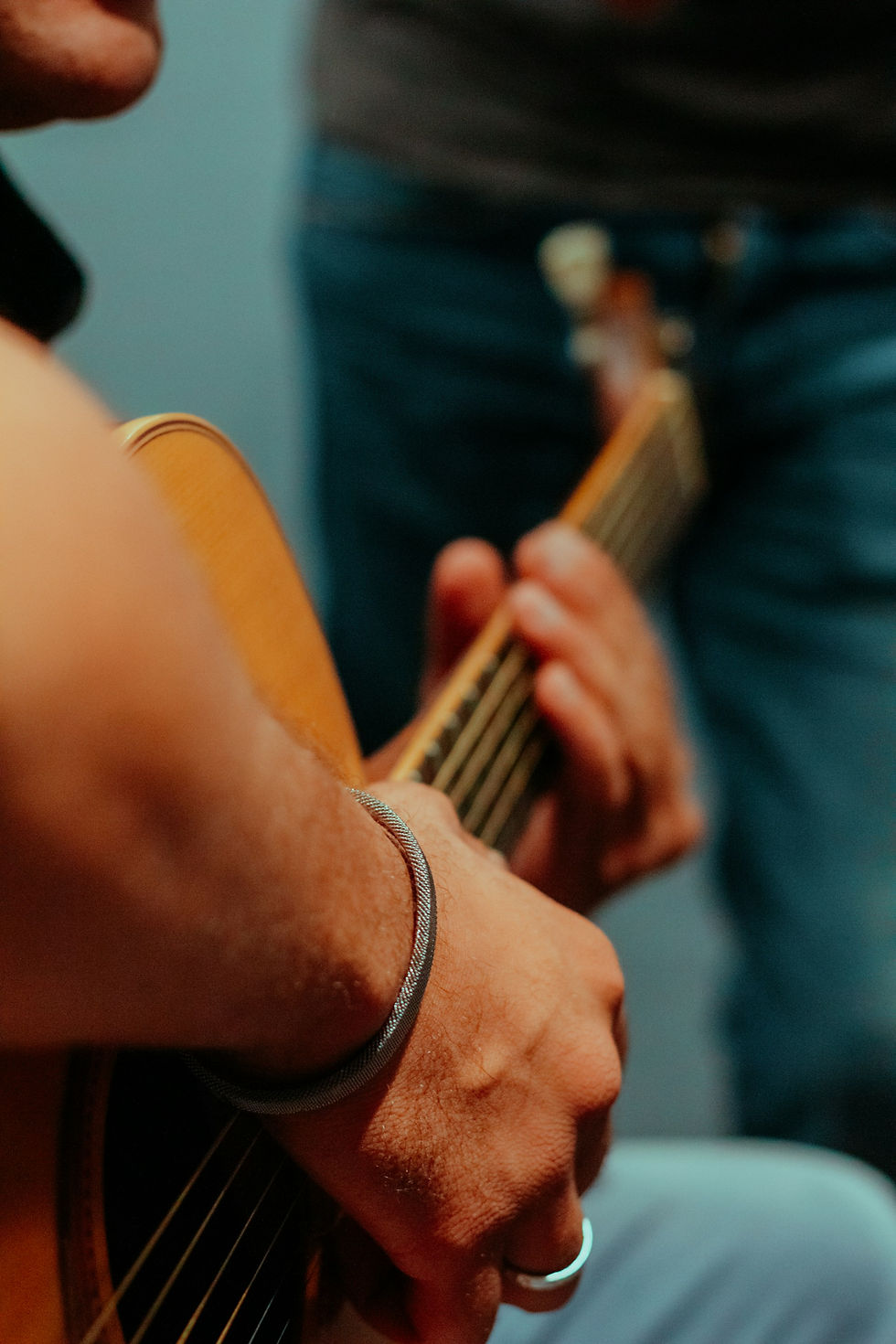 A Moroccan man plays a guitar at a Casablanca museum