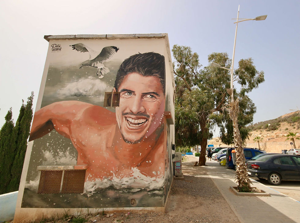 A mural of a surfer in the Amazigh village of Taghazout near Agadir