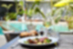 Dining poolside at an eco-friendly hotel in Dakar