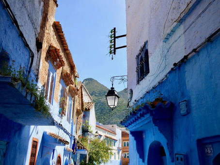 A street lined with blue buildings in Chefchaouen, Morocco