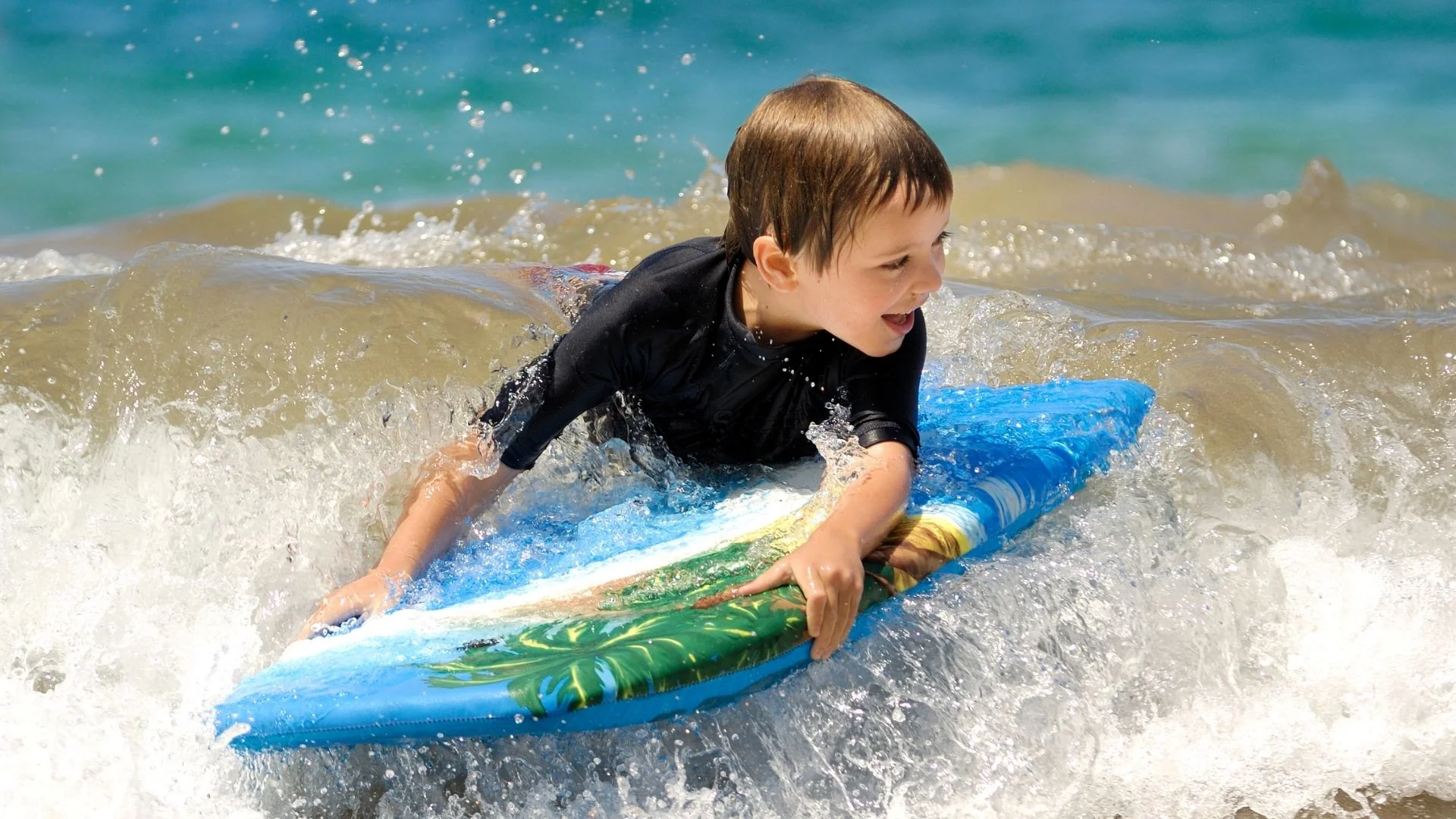 Kids-Surfing-how-to-teach-your-kid-how-to-surf_2000x.webp