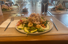 seafood salad .HEIC dinner salad of scallops, shrimp , pickerel, squid, mixed greens, avocado