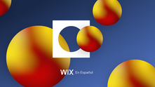 Imagen conceptual que representa la fusión visual de las identidades de Sphere Studio y Wix, con esferas en tonos rojo y amarillo sobre fondo azul y el logotipo de Wix en el centro, simbolizando su integración en el mercado español.