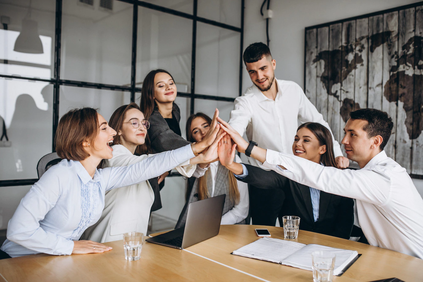 group-people-working-out-business-plan-office_1303-15861.webp