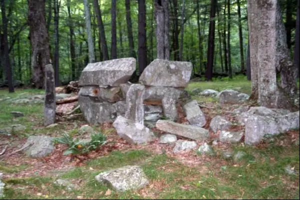 Stone ruins in a forest from the abandoned settlement of Bara-Hack.