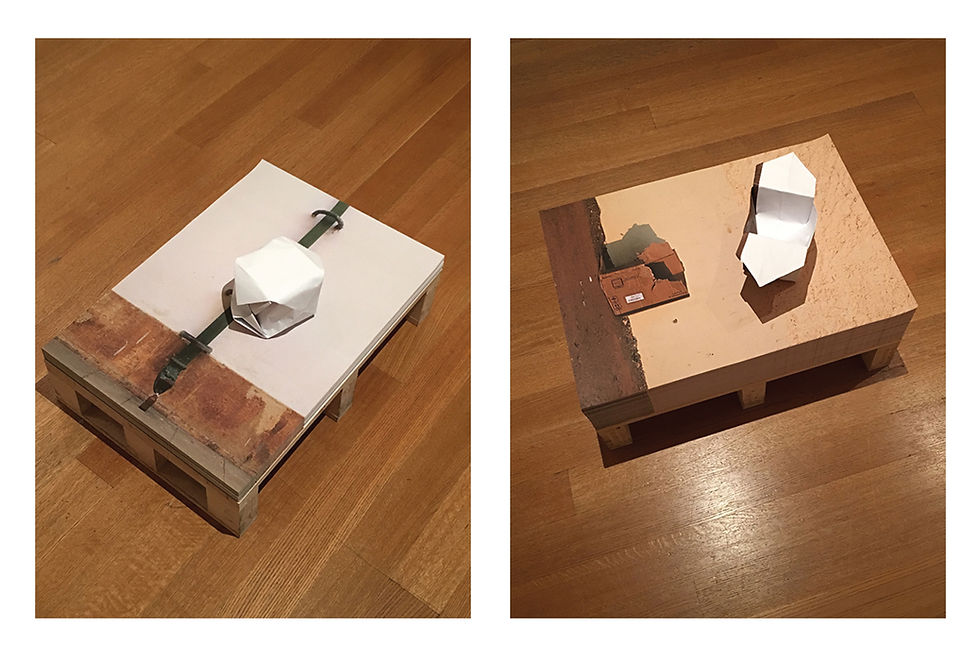 Raymond Mingst and Arthur Bruso, "Volume and Void," an art intervention at the Ocean of Images exhibition at the Museum of Modern Art. Paper origami sculptures fashioned out of Edson Chagas posters. Mingst, Balloon, 6"w x 6"l x 5"h. Bruso, Basket, 8"w x 6"l x 3"h.