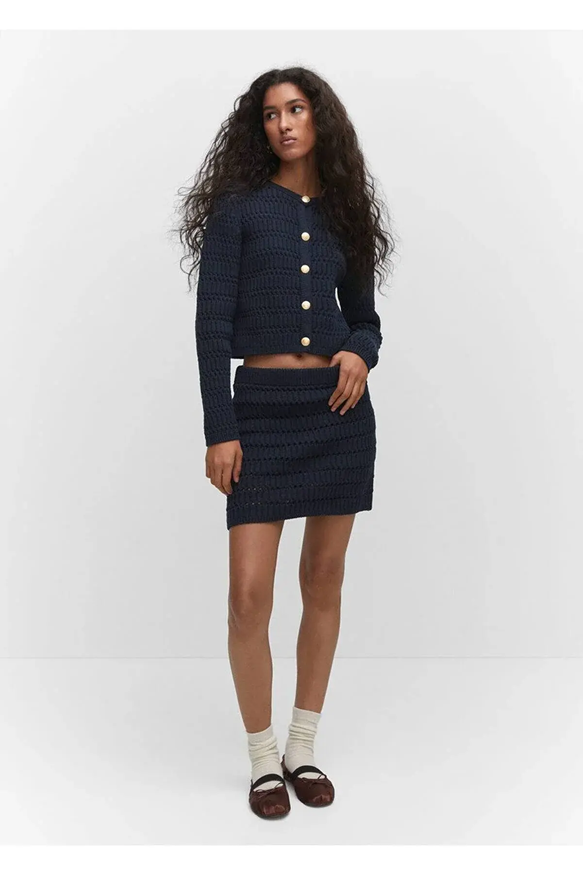 Mango Delikli dokumalı mini etek