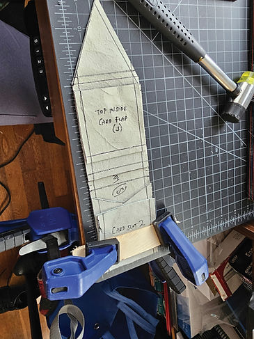 stitching shozab_s wallet together.jpg