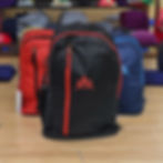 Black, red, and blue backpacks