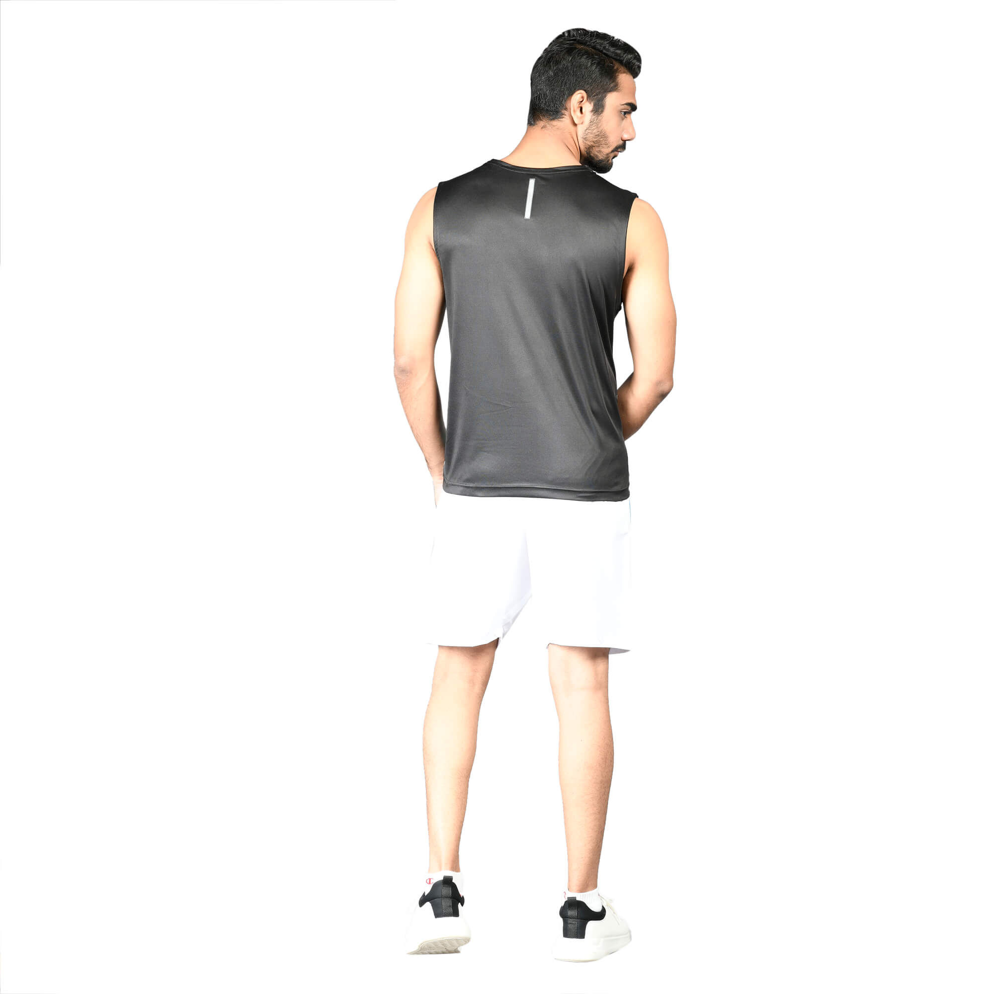 Man in black athletic shirt and white shorts