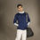 Thumbnail: Man in navy blue jacket and white pants
