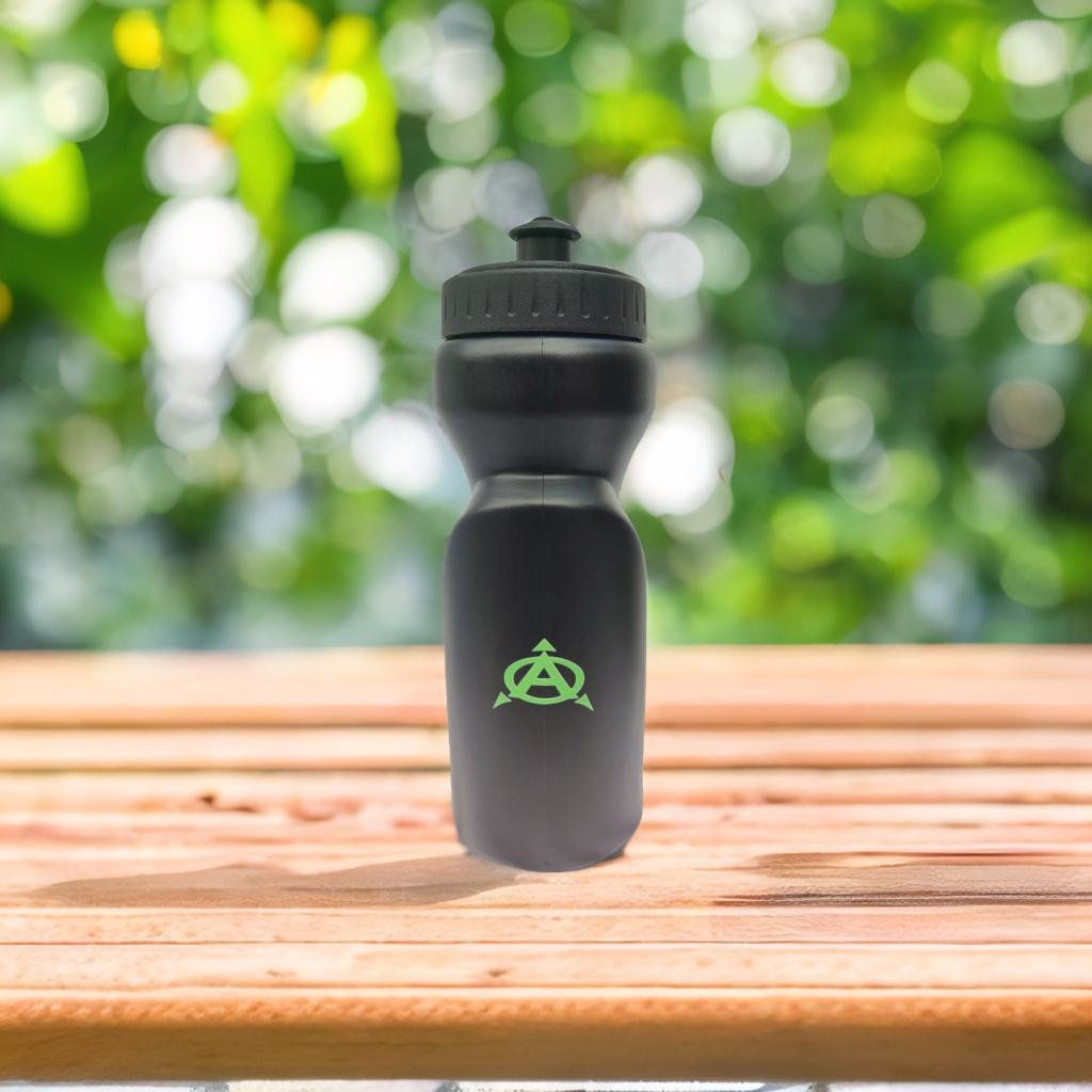 Black water bottle with logo on wooden table