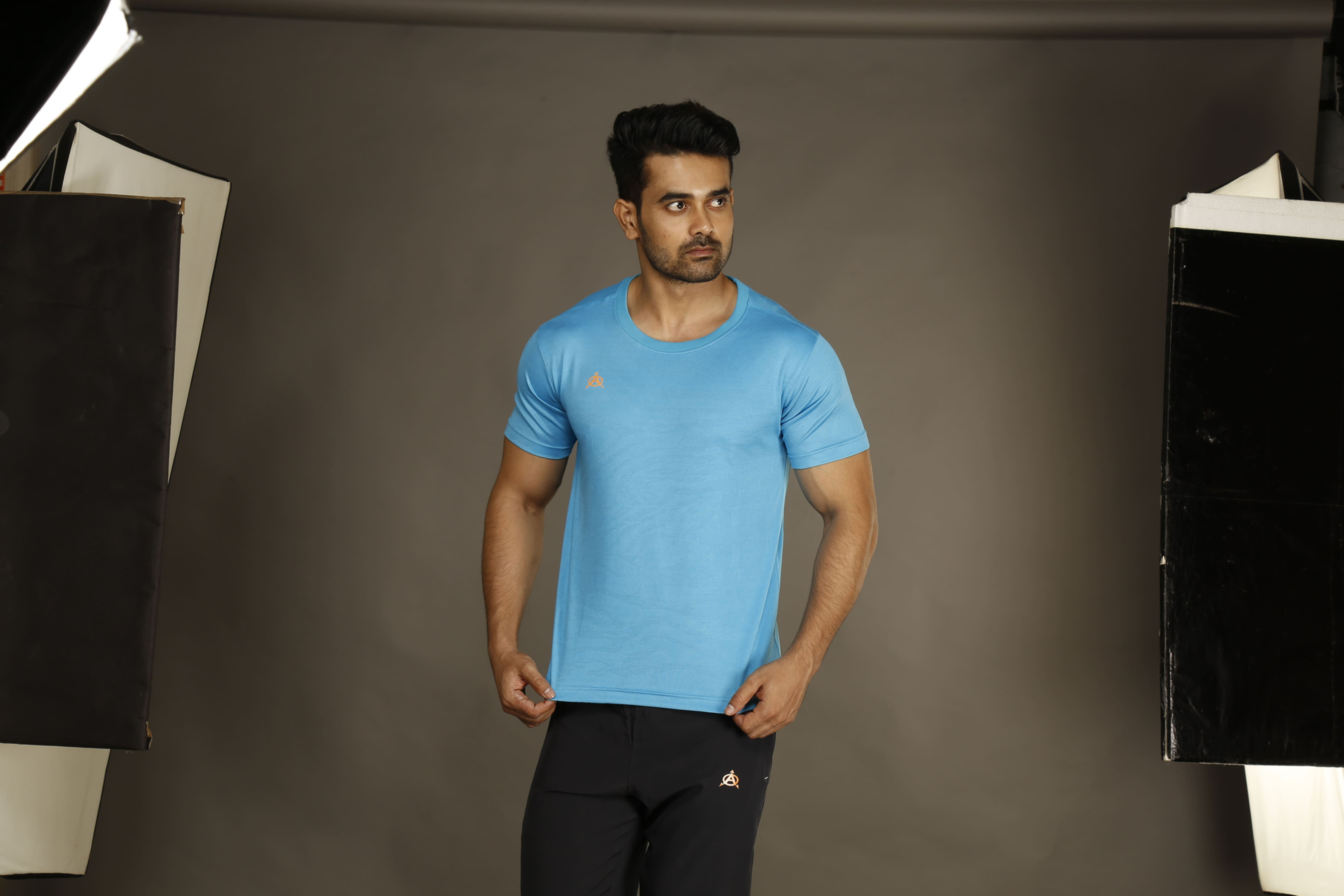 Man modeling light blue Raglan Cutting Football jersey Set (AFJS#18)