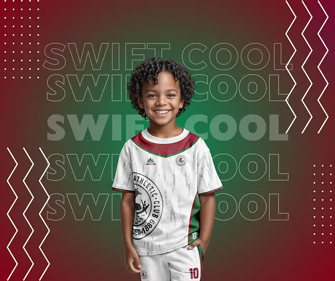 Smiling child models Swift Cool referee jersey