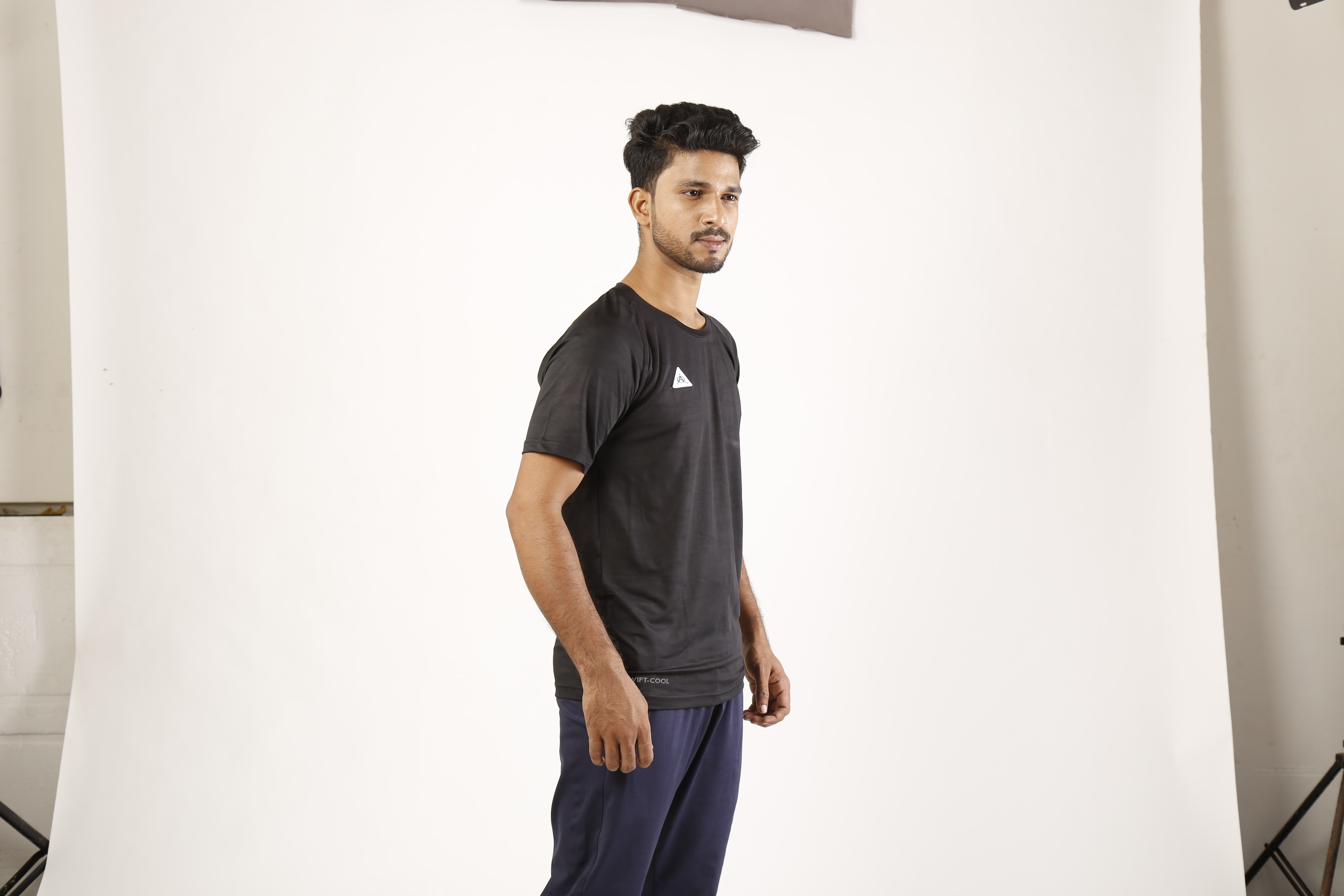 Man in black Adidas T-shirt