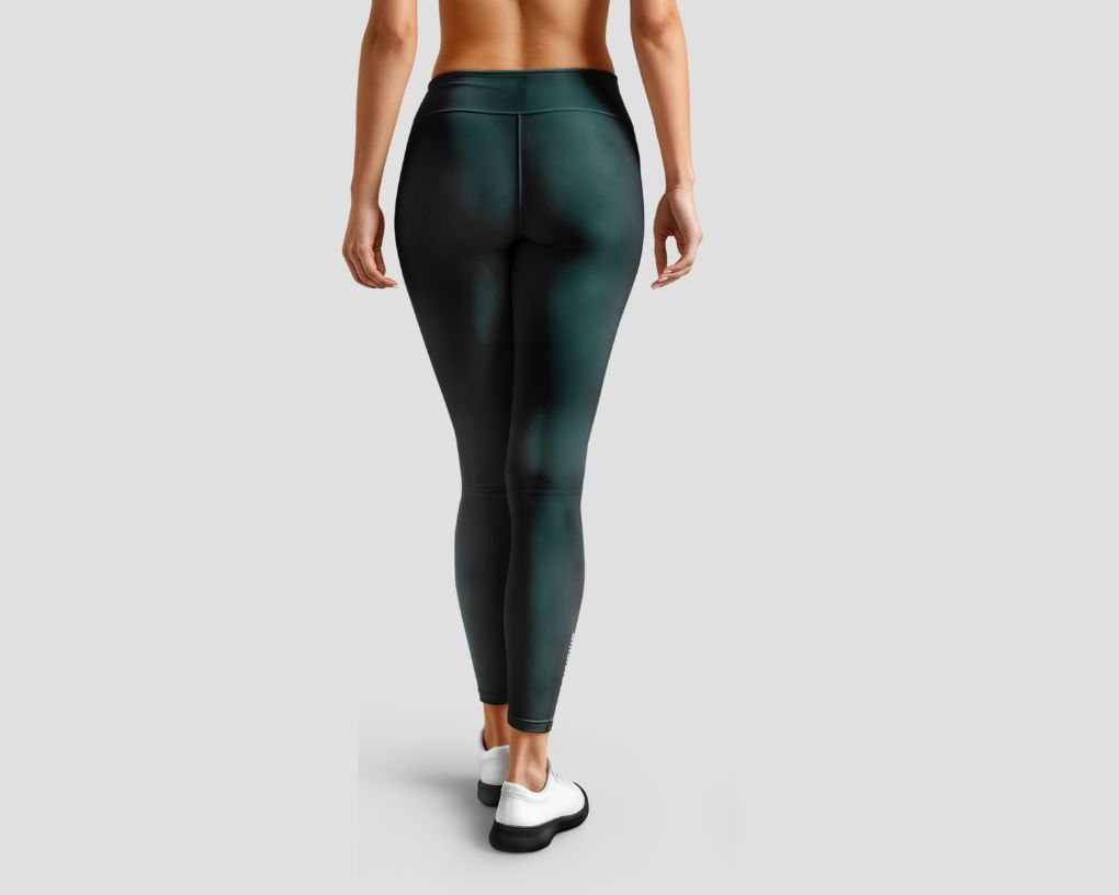 Woman in dark green leggings