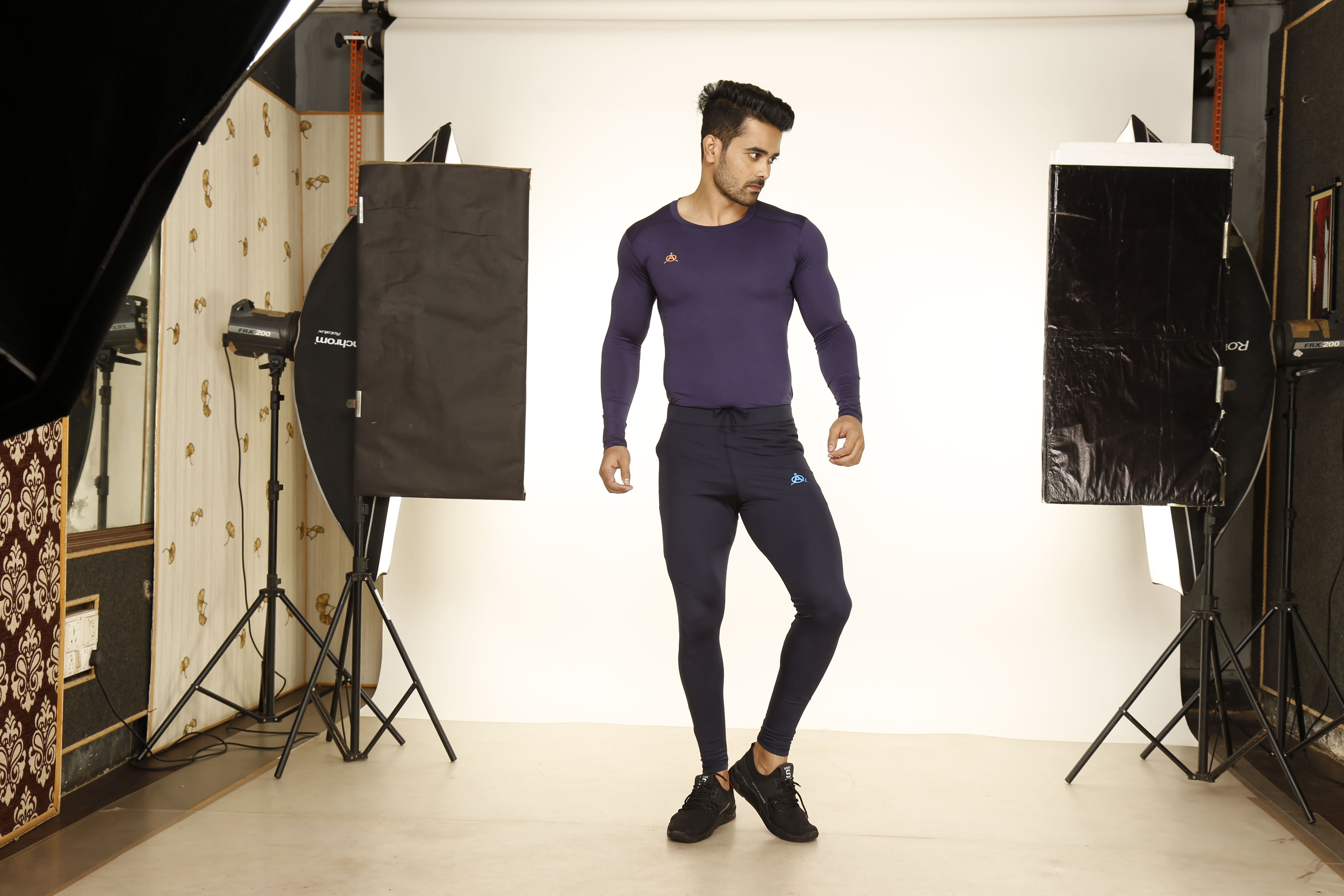 Man modeling navy athletic wear