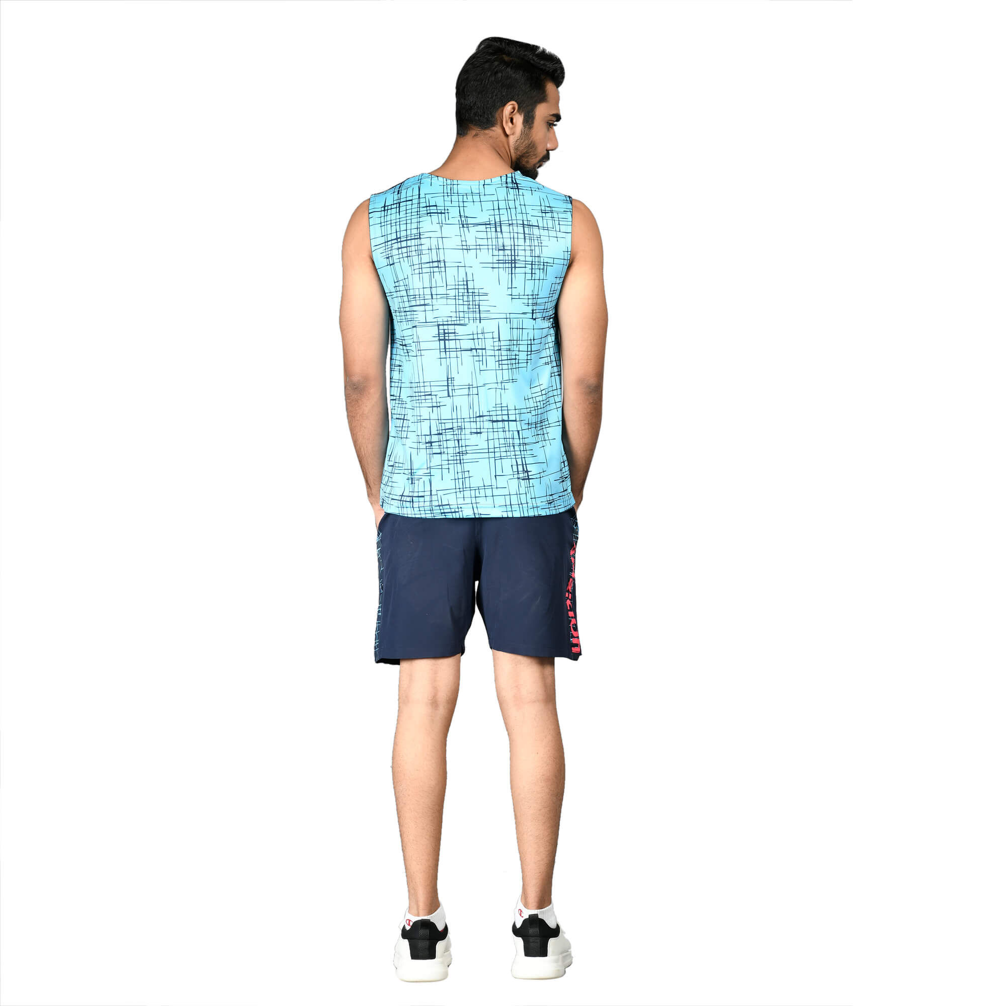 Man in blue sleeveless shirt and navy shorts