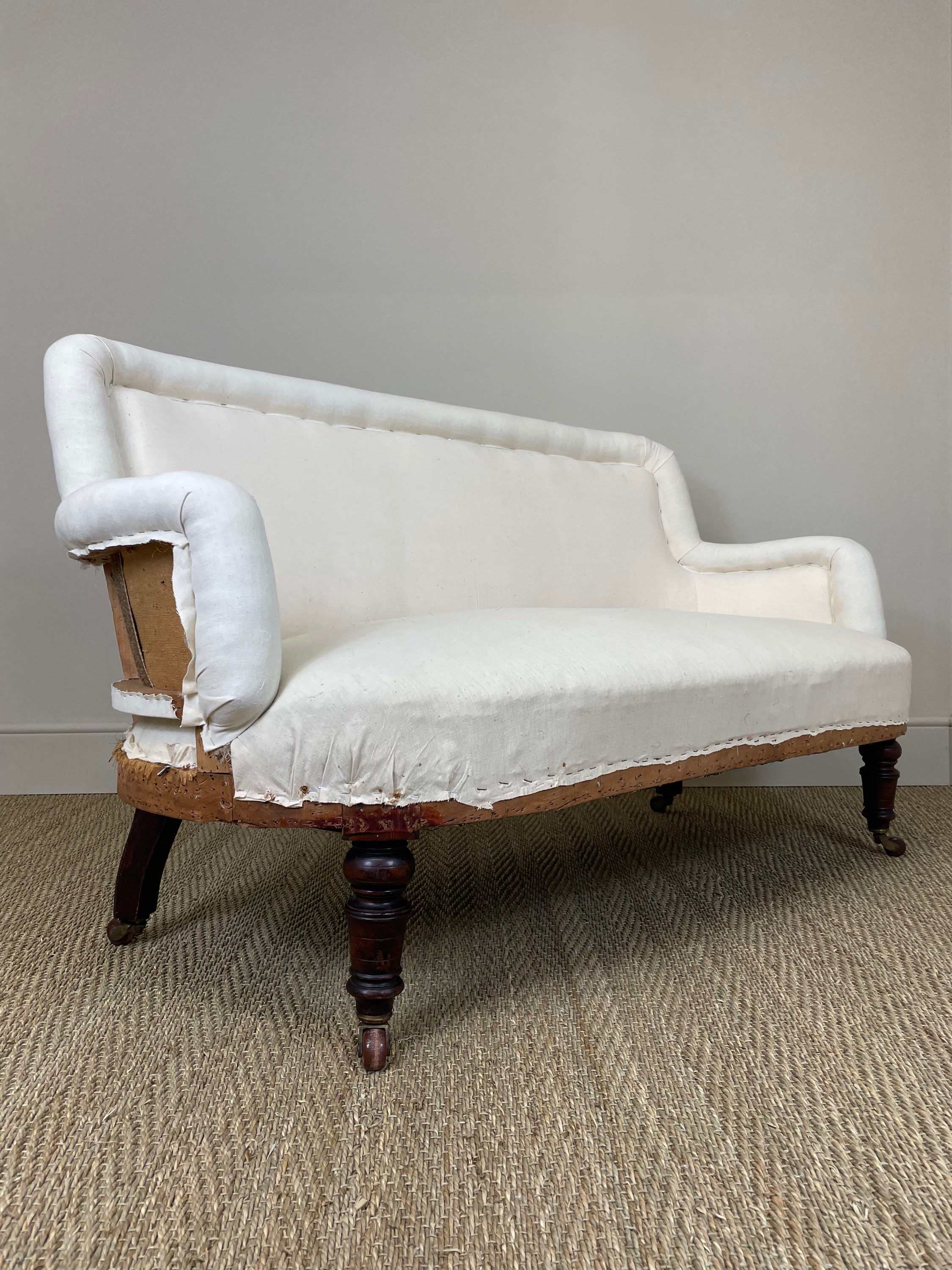 LATE VICTORIAN SOFA (REUPHOLSTERY INCLUSIVE)