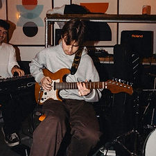 A picture of our guitar teacher: Jake Heron