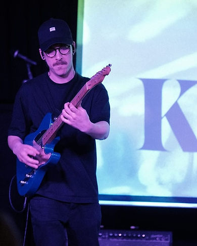 Vincenzo Playing Guitar