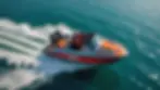 Close-up view of a jet boat navigating through shallow waters
