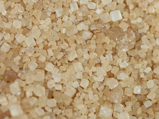 Fabricante de açúcar bruto não tem direito a benefício de ICMS para cesta básica