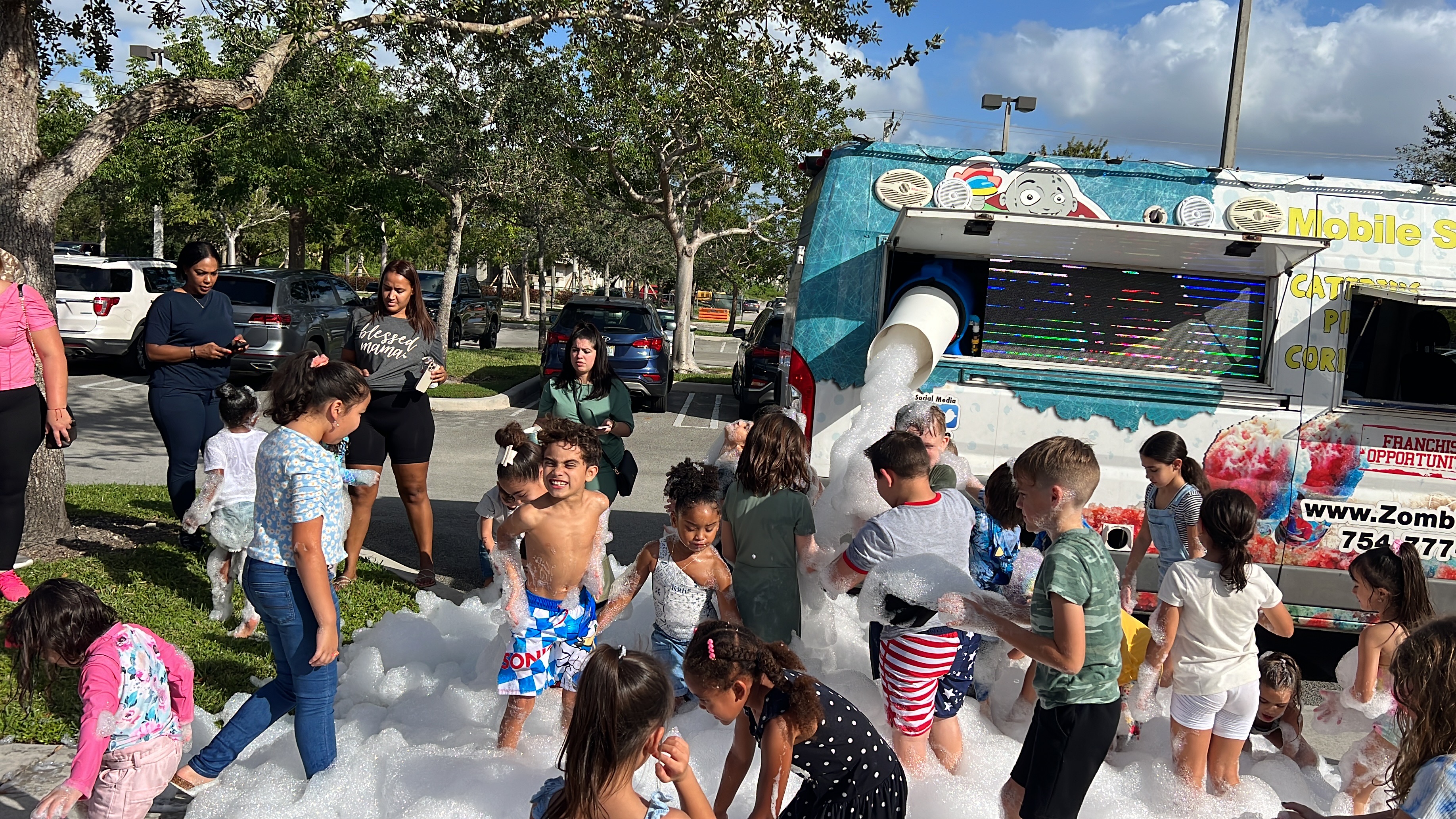excited children on the foam machine rentals 