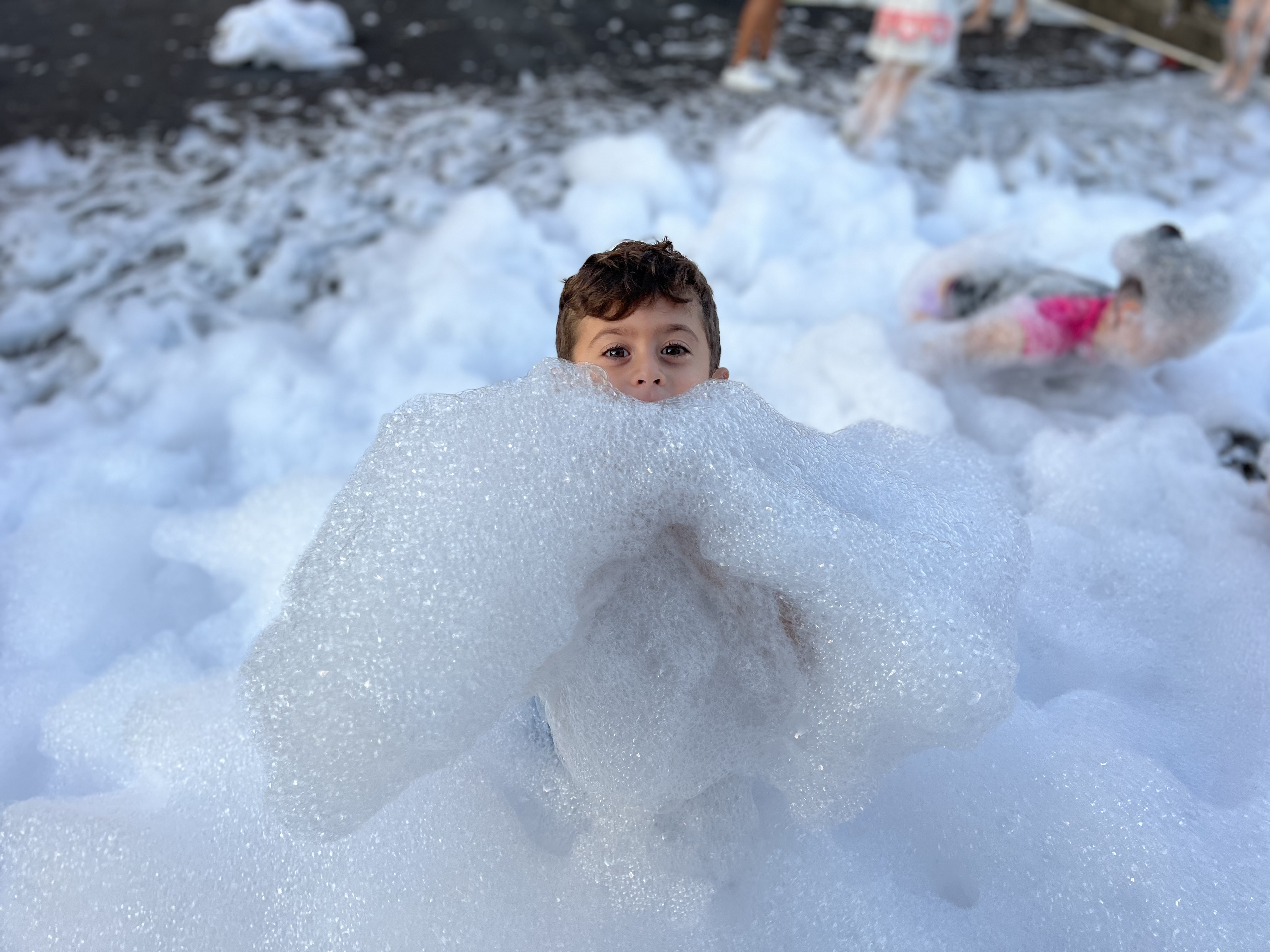 boy playing on the bubble foam