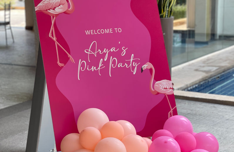 Pink flamingo birthday welcome sign with balloons in Bangalore
