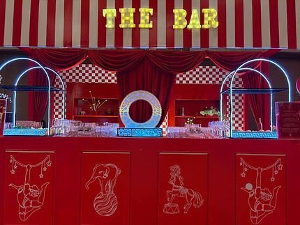 Custom-designed carnival bar at Shangri-La Bangalore with playful signage and vibrant detailing – Atelier17 Events India