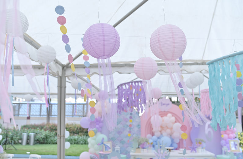 Pastel jellyfish-style over hanging decor for under the sea birthday setup in Bangalore