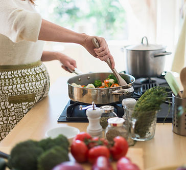 Woman Cooking in Kitchen