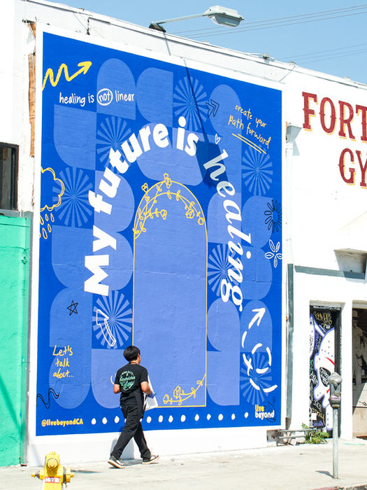A handpaint wallscape in Los Angeles near a high school for the Live Beyond Toxic Stress campaign