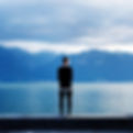 Man overlooking water