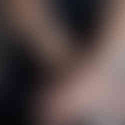 various armband tattoos on a male's forearms