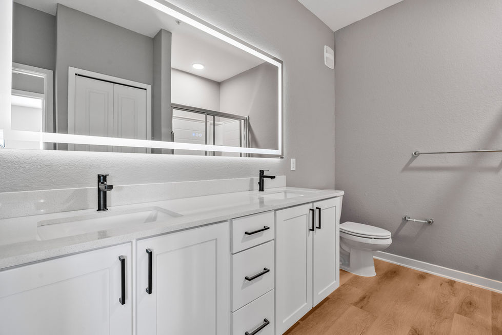 Modern bedroom interior with subtle accent colors at Creekside Ranch Apartments.